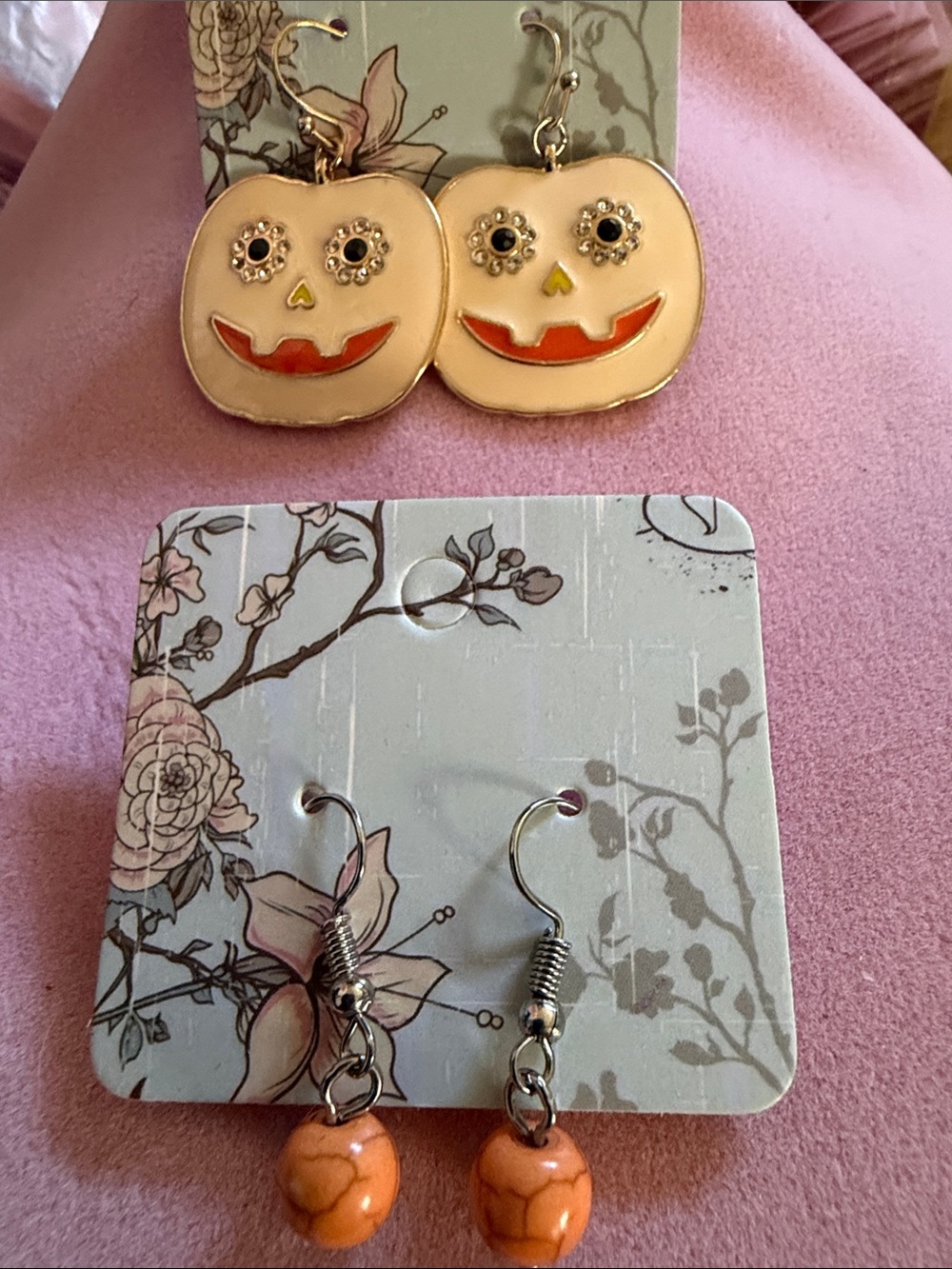 2 Earrings 1-Gold-Tone Pumpkin Face. 2-Orange Silver Tone Hook. (J0234)